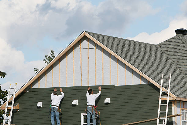 Professional Siding technician working in Arden, NC